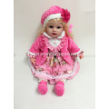 22" pink coat and blond hair doll